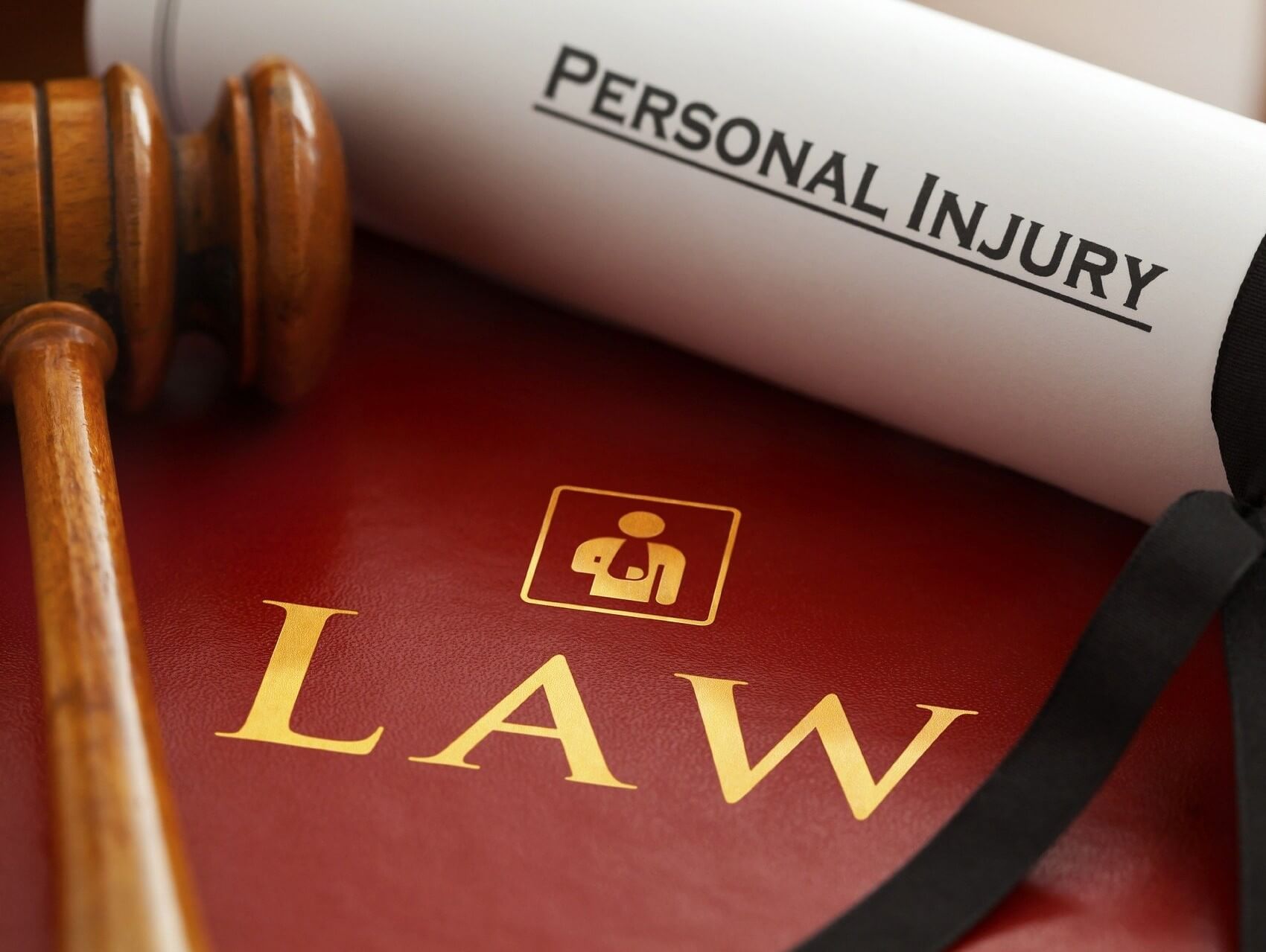 a gavel on top of a book titled scranton personal injury lawyer