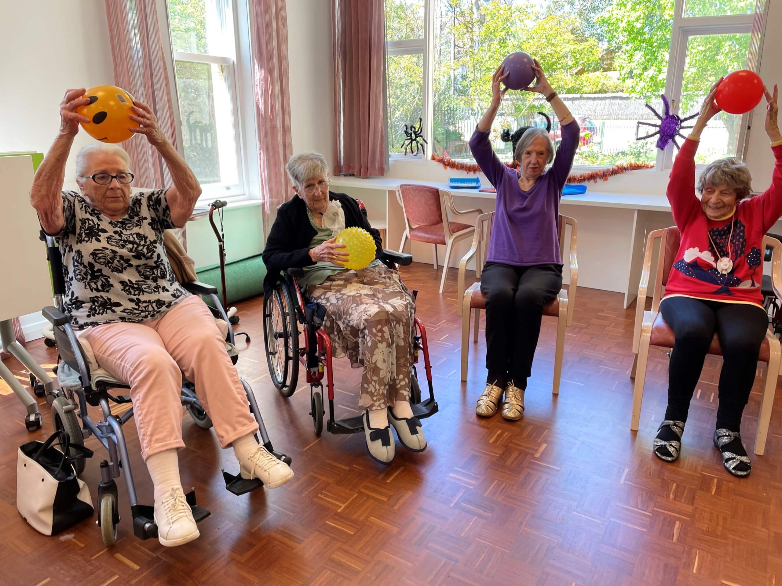 four grandmothers in a nursing home